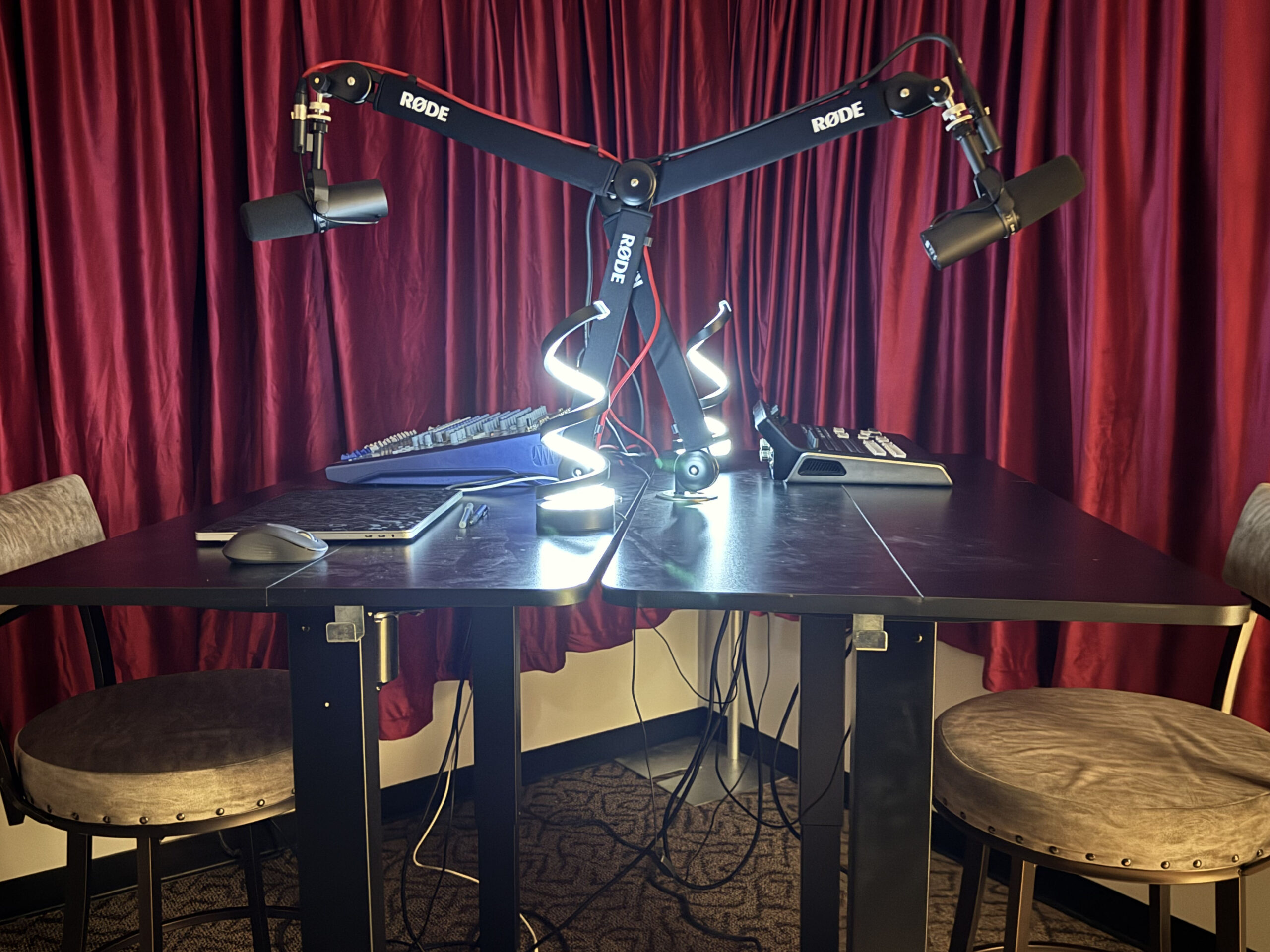 State-of-the-Art Podcast Studio | Big Wheel Digital Media "Professional podcast studio at Big Wheel Digital Media with soundproof walls, broadcast microphones, and multi-track recording equipment."<br />